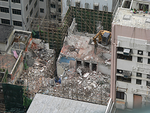 Demolition of a building viewed from above, Sheung Wan, 22 March 2009