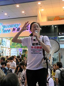 Addressing crowds on their way to the annual June Fourth Memorial Rally, Great George Street, Causeway Bay, 4 June 2009