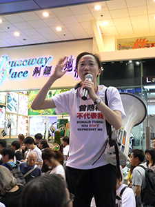 Tanya Chan addressing crowds on their way to the annual June Fourth Memorial Rally, Great George Street, Causeway Bay, 4 June 2009