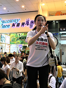 Tanya Chan addressing crowds on their way to the annual June Fourth Memorial Rally, Great George Street, Causeway Bay, 4 June 2009