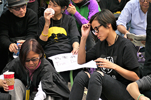 Pop singer Denise Ho, participating in a sit-in on the final day of the Admiralty Umbrella Movement occupation site, 11 December 2014