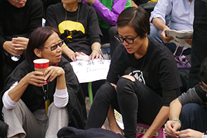 Pop singer Denise Ho, participating in a sit-in on the final day of the Admiralty Umbrella Movement occupation site, 11 December 2014