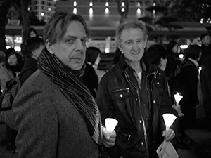 Gérard Henry and Mike Ingham, at a candlelight vigil, outside the Legislative Council Building, Central, 12 January 2010