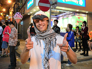 Man with Osama Bin Laden mask taken off, D'Aguilar Street, 31 October 2004