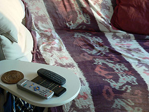 Sofa and remote controls in a domestic interior, Sheung Wan, 6 October 2004