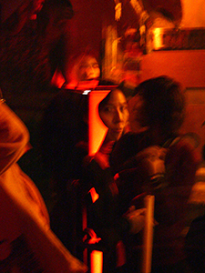 Audience member at a performance, A'ha, Elgin Street, Central, 22 November 2004