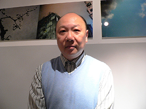 Patrick Lee, at an exhibition of his photos in a gallery off Hollywood Road, 23 November 2004