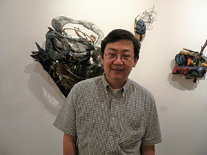Oscar Ho, at the opening of his exhibition 'Mapping Identities: The Art and Curating of Oscar Ho', Para Site art space, 5 November 2004