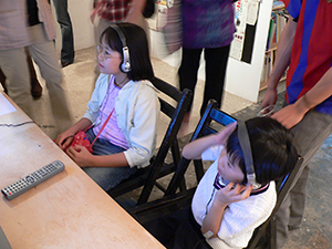 The artist's children at the opening of 'Mapping Identities: The Art and Curating of Oscar Ho', Para Site art space, 5 November 2004