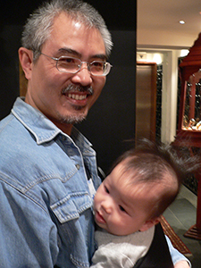 Political cartoonist Zunzi and his son, Kee Club, Wellington Street, Central, 11 November 2004