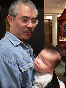 Zunzi and his son, Wellington Street, Central, 11 November 2004