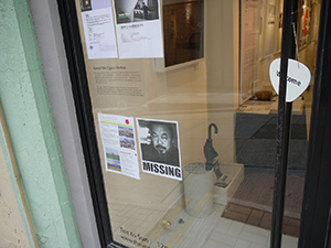 Poster about Ai Weiwei's imprisonment in China, in the window of a venue on Upper Station Street, Tai Ping Shan, 15 May 2011