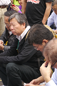 Politician Lee Cheuk-yan participating in a sit-in on the final day of the Admiralty Umbrella Movement occupation site, 11 December 2014