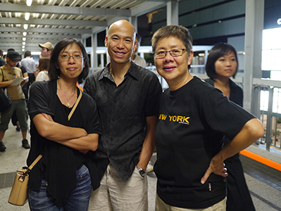 Sara Wong, Warren Leung and Angie Chen, at a protest against an attempt by the Government to introduce national education into the school curriculum, 3 September 2012