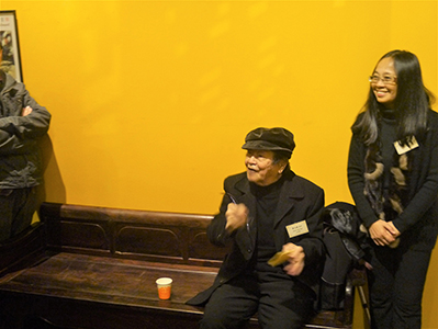 Artists Hon Chi-fun (seated) and Choi Yan-chi, at the opening of an exhibition of Hon's work at the University Museum and Art Gallery, University of Hong Kong, 15 January 2013