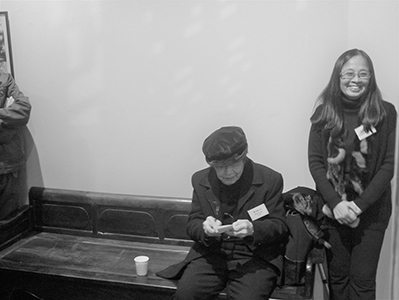 Artists Hon Chi-fun (seated) and Choi Yan-chi, at the opening of an exhibition of Hon's work at the University Museum and Art Gallery, University of Hong Kong, 15 January 2013