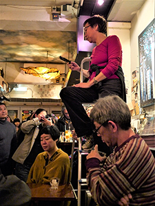 Grace Ma reading a poem at a Moon Poetry Night gathering, Club 71, Man Hing Lane, Central, 10 February 2013