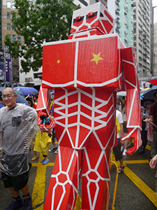 Kacey Wong's robot on the annual pro-democracy march, Hennessy Road, 1 July 2013
