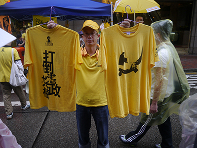 T-shirts for sale on the annual pro-democracy march, 1 July 2013