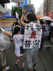 On the annual pro-democracy march, 1 July 2013