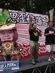Albert Ho addressing crowds on the annual pro-democracy march, 1 July 2013