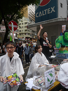 Emily Lau, addressing crowds on the annual pro-democracy march, Hennessy Road, Wanchai, 1 July 2013