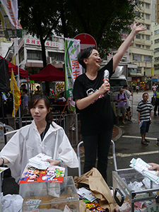 Emily Lau, addressing crowds on the annual pro-democracy march, 1 July 2013