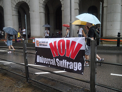 On the annual pro-democracy march, Des Voeux Road Central, 1 July 2013