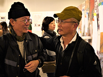 Kwok Mang Ho (left) and Alfred Ko (right) at the opening of a memorial exhibition for Leung Ping-kwan in the basement of the Central Library, Causeway Bay, 9 January 2014