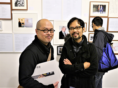 Chan Yuk-keung (left) and Lau Ching Ping (right) at the opening of a memorial exhibition for Leung Ping-kwan in the basement of the Central Library, Causeway Bay, 9 January 2014