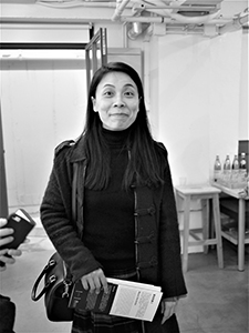 Curator Eve Tam, at an exhibition of Lee Ka Sing's photos, Lumenvision, Jockey Club Creative Arts Centre, Shek Kip Mei, 11 January 2014