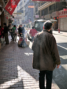 Man smoking, Wing Lok Street, Sheung Wan, 29 January 2014