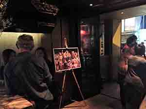 Photograph by David Clarke on display at wine bar Flutes during an event concerning his collaboration with writer Xu Xi, Elgin Street, 27 January 2014