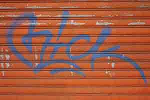Graffiti on the shutters of a closed business, Shek Kip Mei, 3 February 2014