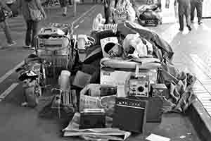 Second hand goods piled up on the street, Sham Shui Po, 3 February 2014