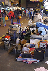 Second hand goods for sale, piled up on the street, Sham Shui Po, 3 February 2014