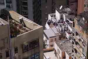 Drying produce on a roof, Sheung Wan, 20 February 2014