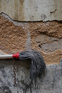 Wall of an alleyway, with a mop, Sham Shui Po, 3 February 2014