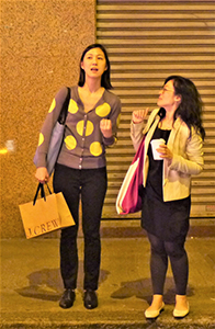 M+ curators Lesley Ma (left) and Tina Pang (right), after the Mobile M+ 'Neon Signs. HK' project opening, Yau Ma Tei, 20 March 2014