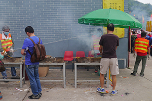Offering incense on the birthday of Tin Hau, Joss House Bay, 22 April 2014