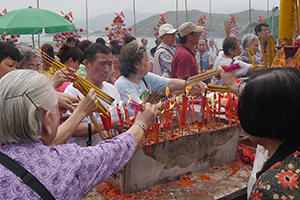 Offering incense on the birthday of Tin Hau, Joss House Bay, 22 April 2014