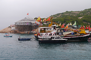 Boats and temporary bamboo-framed structure on a headland, Po Toi island, 21 April 2014