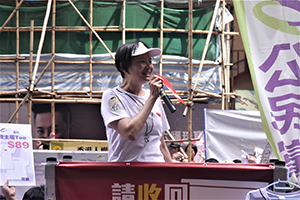 Audrey Eu addressing people arriving for the annual pro-democracy march, Great George Street, 1 July 2014