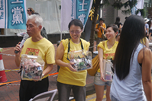 Addressing crowds on their way to the annual pro-democracy march, Causeway Bay, 1 July 2014