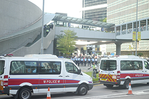 Police vehicles parked on Harcourt Road because of a student-led protest at Civic Square, Central Government Offices Complex, Admiralty, 27 September 2014