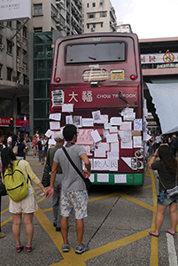 Bus barricade with posters at the Mongkok Umbrella Movement occupation site, 30 September 2014
