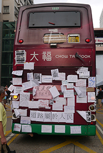 Bus barricade with posters at the Mongkok Umbrella Movement occupation site, 30 September 2014