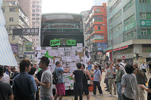 Bus barricade with posters at the Mongkok Umbrella Movement occupation site, 30 September 2014