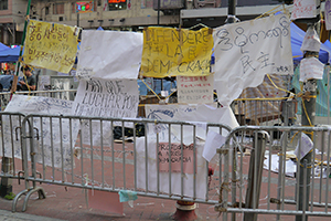 Posters in different languages at the Causeway Bay Umbrella Movement occupation site, 14 October 2014