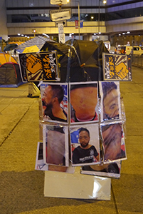 Posters concerning Ken Tsang at the Admiralty Umbrella Movement occupation site, Tamar Street, 20 October 2014